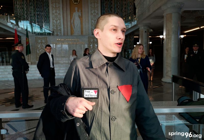 Dzmitry Paliyenka wearing prison clothes with a red triangle during the hearing of his appeal at the Supreme Court. February 14, 2020. The badge was used at Nazi death camps to mark political prisoners and anarchists..