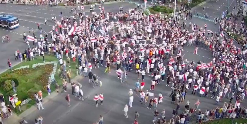 A snapshot from a street camera in central Brest showing protesters dancing at an intersection on September 13, 2020