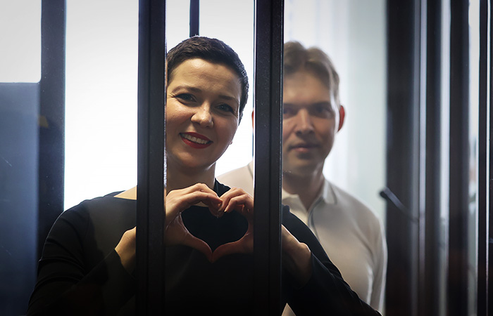 Maryia Kalesnikava and Maksim Znak at the trial