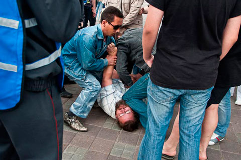 Minsk resident Uladzimir Marozau choked to unconscious by people in mufti on July 6 outside the National Library