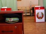 Policeman governs electoral process at polling station in Rečyca